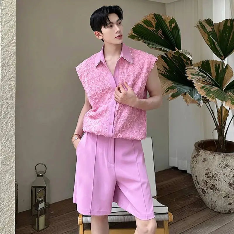 Model wearing pink three-dimensional patchwork sleeveless top and shorts set.
